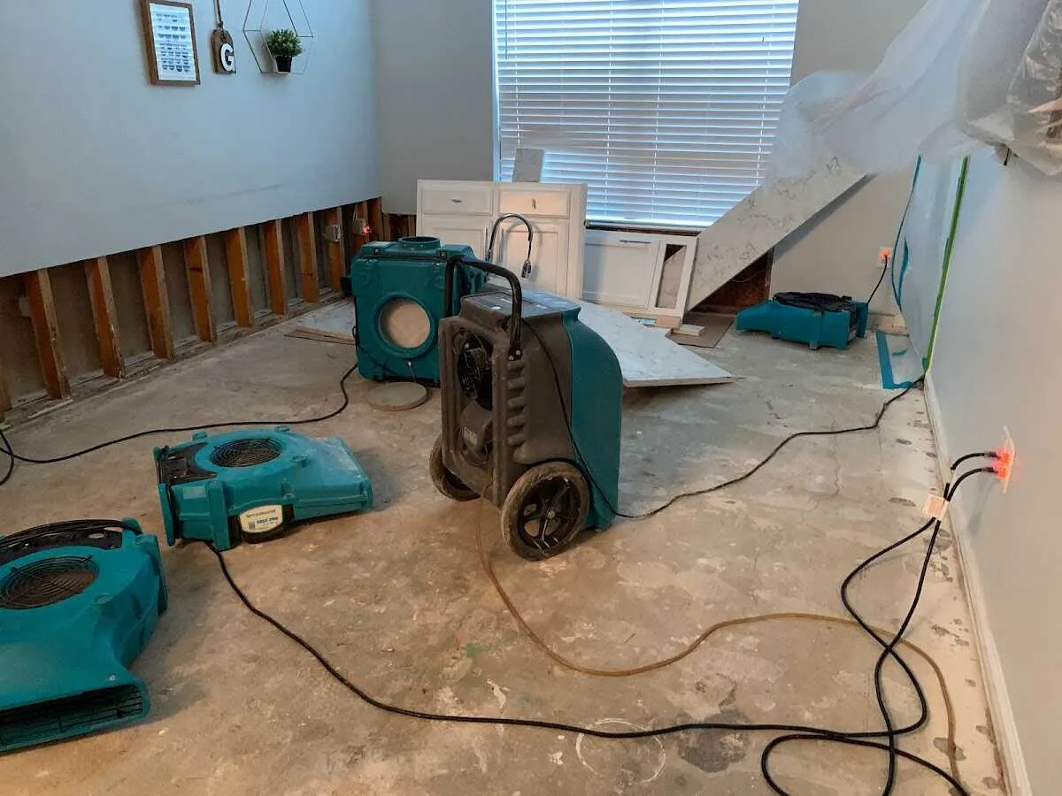 Dehumidifier in flood-cut room for Water Damage Restoration in North College Hill